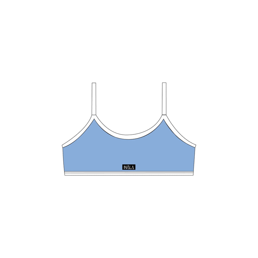 light pale baby blue white activewear matching set crop top spaghetti strap sleeveless contrast trim round neck  stretchy pilates yoga tennis golf strength training everyday soft freedom light support gym clothes athleisure workout inala quito ecuador slow fashion international global handmade sustainable