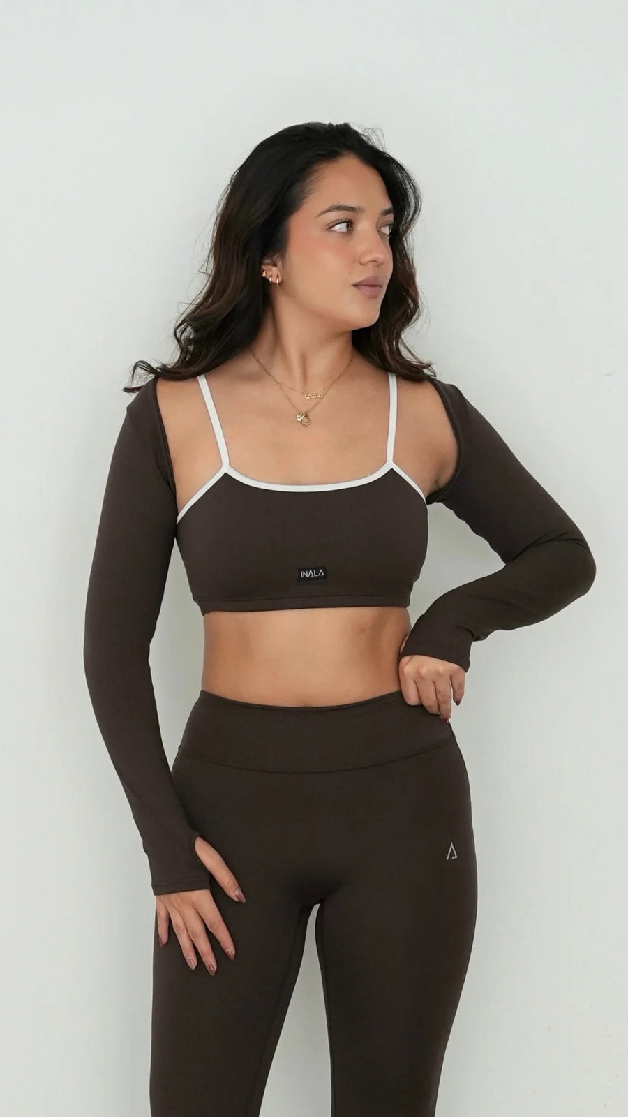 dark brown white activewear matching set crop top spaghetti strap sleeveless contrast trim round neck bolero high waisted flare leggings stretchy pilates yoga tennis golf strength training everyday soft freedom light support gym clothes athleisure workout inala quito ecuador slow fashion international global handmade sustainable