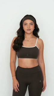 dark brown white activewear matching set crop top spaghetti strap sleeveless contrast trim round neck headband high waisted flare leggings stretchy pilates yoga tennis golf strength training everyday soft freedom light support gym clothes athleisure workout inala quito ecuador slow fashion international global handmade sustainable