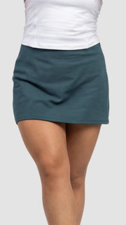 dark forest green white skirt skort activewear matching set crop top spaghetti strap sleeveless contrast trim round neck bolero headband stretchy pilates yoga tennis golf strength training everyday pockets soft freedom light support gym clothes athleisure workout inala quito ecuador slow fashion international global handmade sustainable