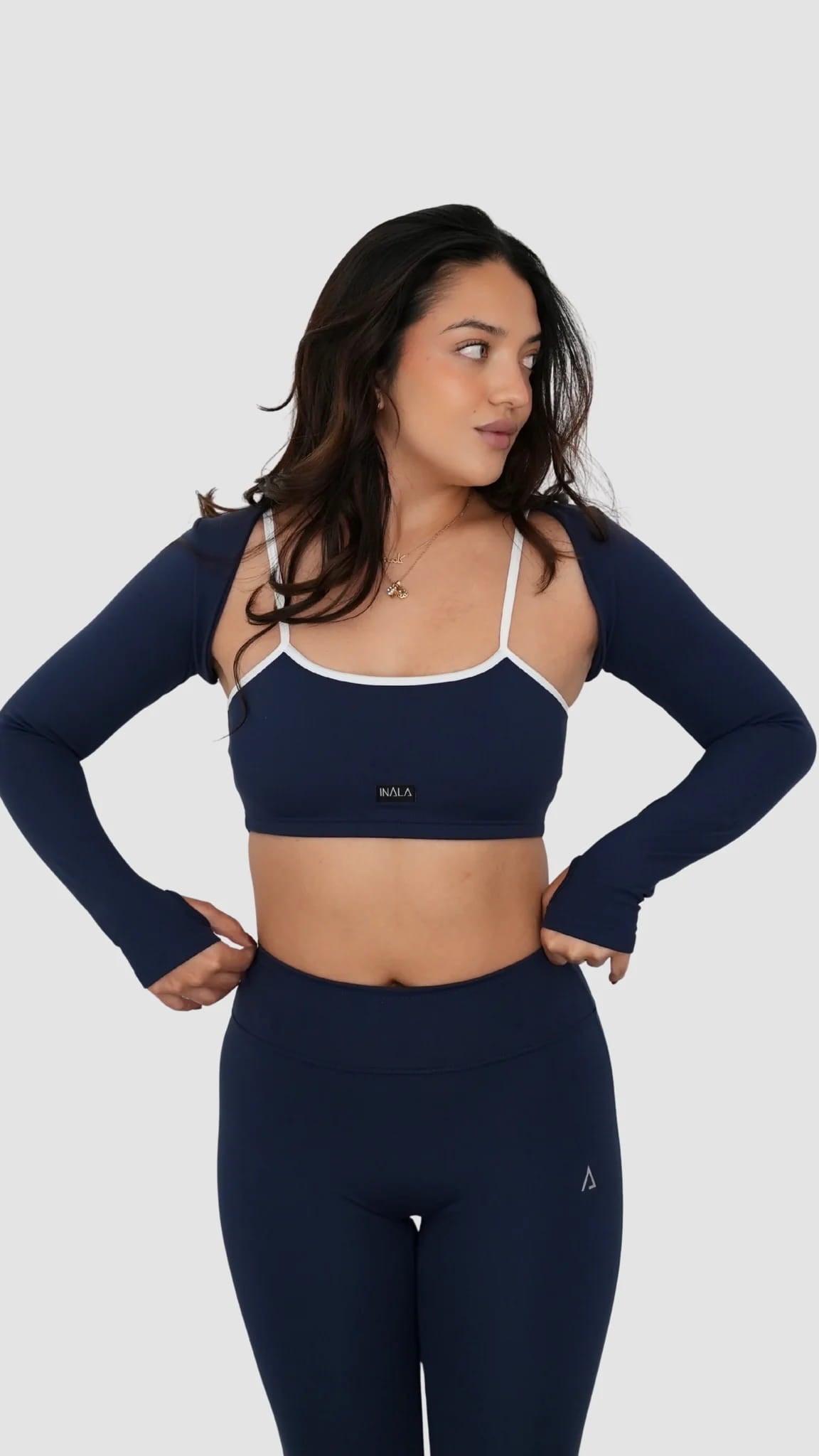 navy blue white activewear matching set crop top spaghetti strap sleeveless contrast trim round neck bolero high waisted flare leggings stretchy pilates yoga tennis golf strength training everyday soft freedom light support gym clothes athleisure workout inala quito ecuador slow fashion international global handmade sustainable