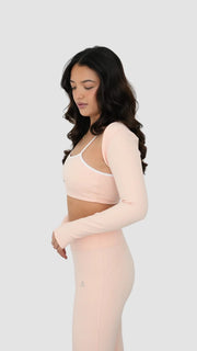 light pale baby pink white activewear matching set crop top spaghetti strap sleeveless contrast trim round neck bolero high waisted flare leggings stretchy pilates yoga tennis golf strength training everyday soft freedom light support gym clothes athleisure workout inala quito ecuador slow fashion international global handmade sustainable