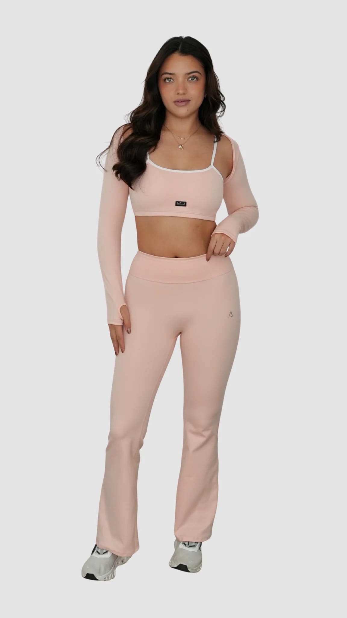 light pale baby pink white activewear matching set crop top spaghetti strap sleeveless contrast trim round neck bolero high waisted flare leggings stretchy pilates yoga tennis golf strength training everyday soft freedom light support gym clothes athleisure workout inala quito ecuador slow fashion international global handmade sustainable