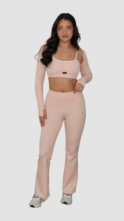 light pale baby pink white activewear matching set crop top spaghetti strap sleeveless contrast trim round neck bolero high waisted flare leggings stretchy pilates yoga tennis golf strength training everyday soft freedom light support gym clothes athleisure workout inala quito ecuador slow fashion international global handmade sustainable