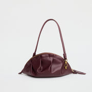 medium gyoza bag burgundy purse handbag crossbody shoulder maroon gold hardware adjustable strap leather zipper madrid spain international fashion imported independent designer slow fashion brand