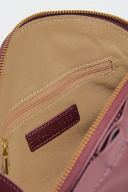 medium gyoza bag burgundy purse handbag crossbody shoulder maroon gold hardware adjustable strap leather zipper madrid spain international fashion imported independent designer slow fashion brand