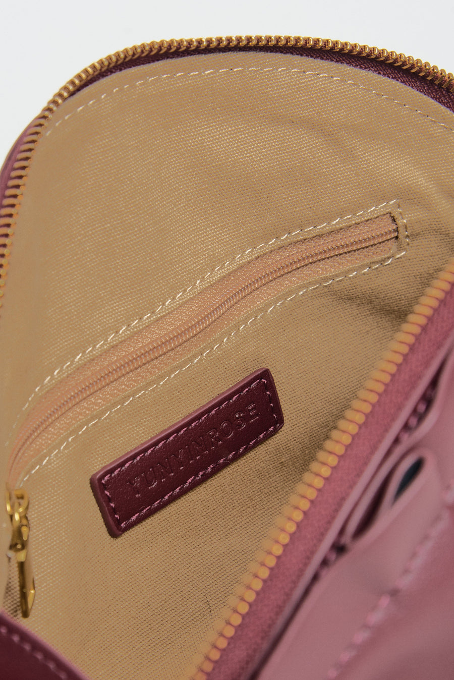 medium gyoza bag burgundy purse handbag crossbody shoulder maroon gold hardware adjustable strap leather zipper madrid spain international fashion imported independent designer slow fashion brand