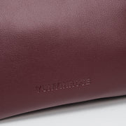 medium gyoza bag burgundy purse handbag crossbody shoulder maroon gold hardware adjustable strap leather zipper madrid spain international fashion imported independent designer slow fashion brand