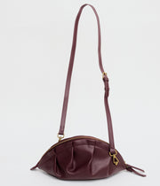 medium gyoza bag burgundy purse handbag crossbody shoulder maroon gold hardware adjustable strap leather zipper madrid spain international fashion imported independent designer slow fashion brand