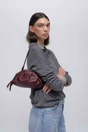 medium gyoza bag burgundy purse handbag crossbody shoulder maroon gold hardware adjustable strap leather zipper madrid spain international fashion imported independent designer slow fashion brand