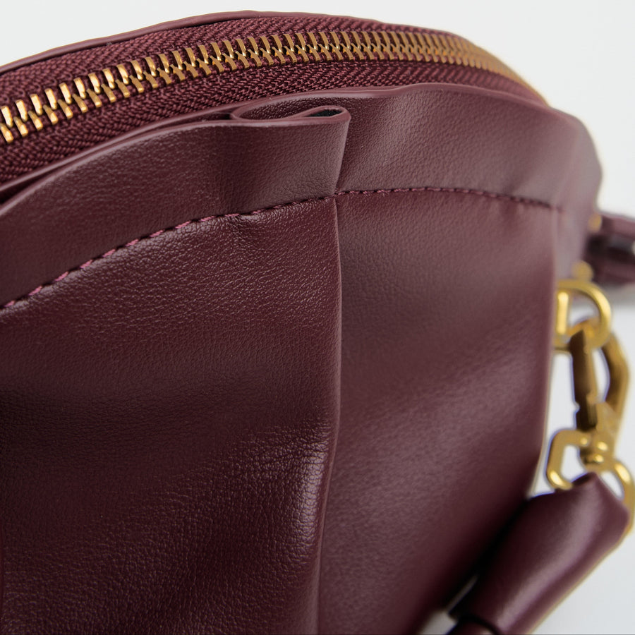 medium gyoza bag burgundy purse handbag crossbody shoulder maroon gold hardware adjustable strap leather zipper madrid spain international fashion imported independent designer slow fashion brand