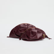 medium gyoza bag burgundy purse handbag crossbody shoulder maroon gold hardware adjustable strap leather zipper madrid spain international fashion imported independent designer slow fashion brand