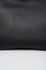 mini gyoza bag black purse handbag crossbody shoulder convertible gold hardware short strap adjustable long strap leather zipper madrid spain international fashion imported independent designer slow fashion brand