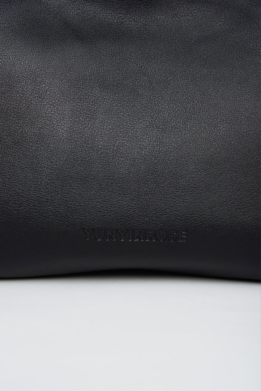 mini gyoza bag black purse handbag crossbody shoulder convertible gold hardware short strap adjustable long strap leather zipper madrid spain international fashion imported independent designer slow fashion brand