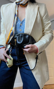 mini gyoza bag black purse handbag crossbody shoulder convertible gold hardware short strap adjustable long strap leather zipper madrid spain international fashion imported independent designer slow fashion brand