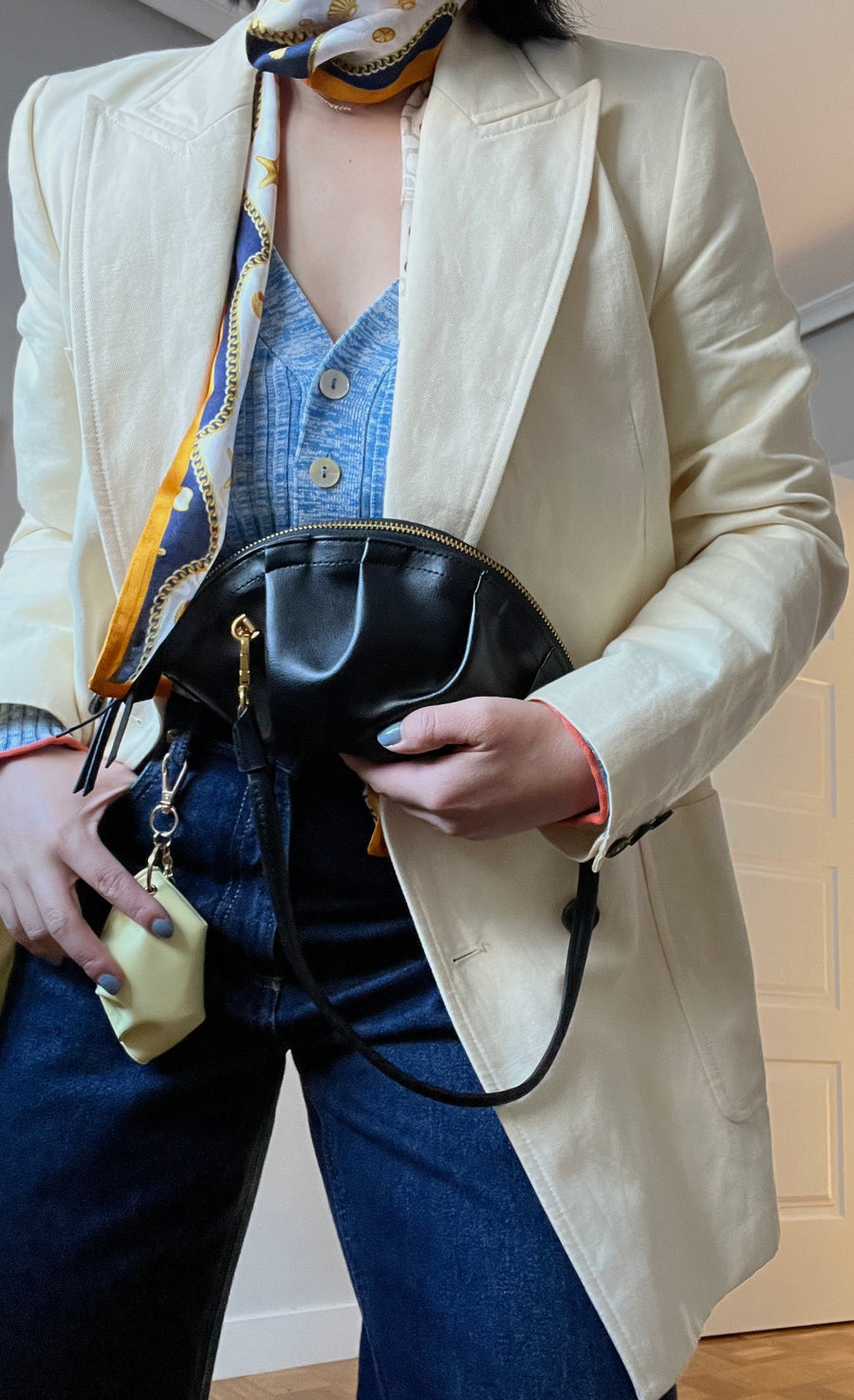 mini gyoza bag black purse handbag crossbody shoulder convertible gold hardware short strap adjustable long strap leather zipper madrid spain international fashion imported independent designer slow fashion brand