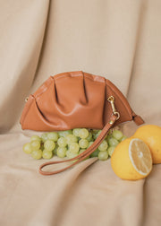 mini gyoza bag brown caramel purse handbag crossbody shoulder tan gold hardware wrist strap adjustable long strap leather zipper madrid spain international fashion imported independent designer slow fashion brand