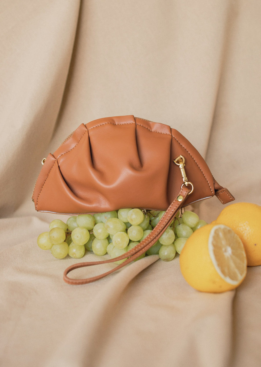 mini gyoza bag brown caramel purse handbag crossbody shoulder tan gold hardware wrist strap adjustable long strap leather zipper madrid spain international fashion imported independent designer slow fashion brand