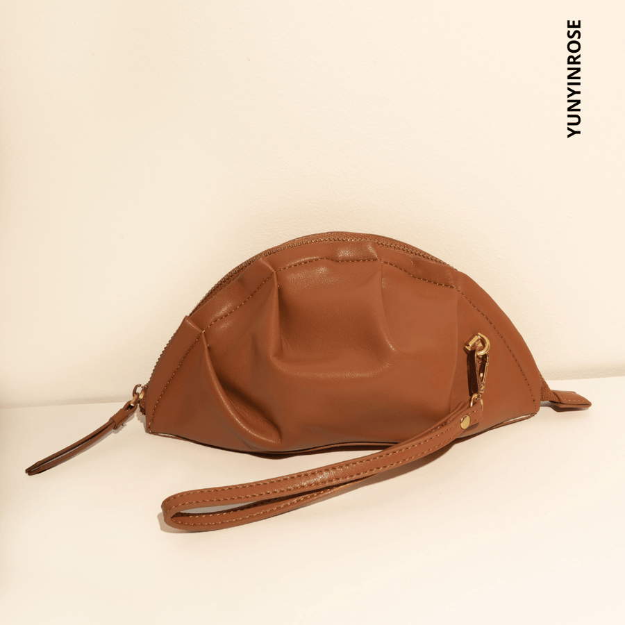 mini gyoza bag brown caramel purse handbag crossbody shoulder tan gold hardware wrist strap adjustable long strap leather zipper madrid spain international fashion imported independent designer slow fashion brand