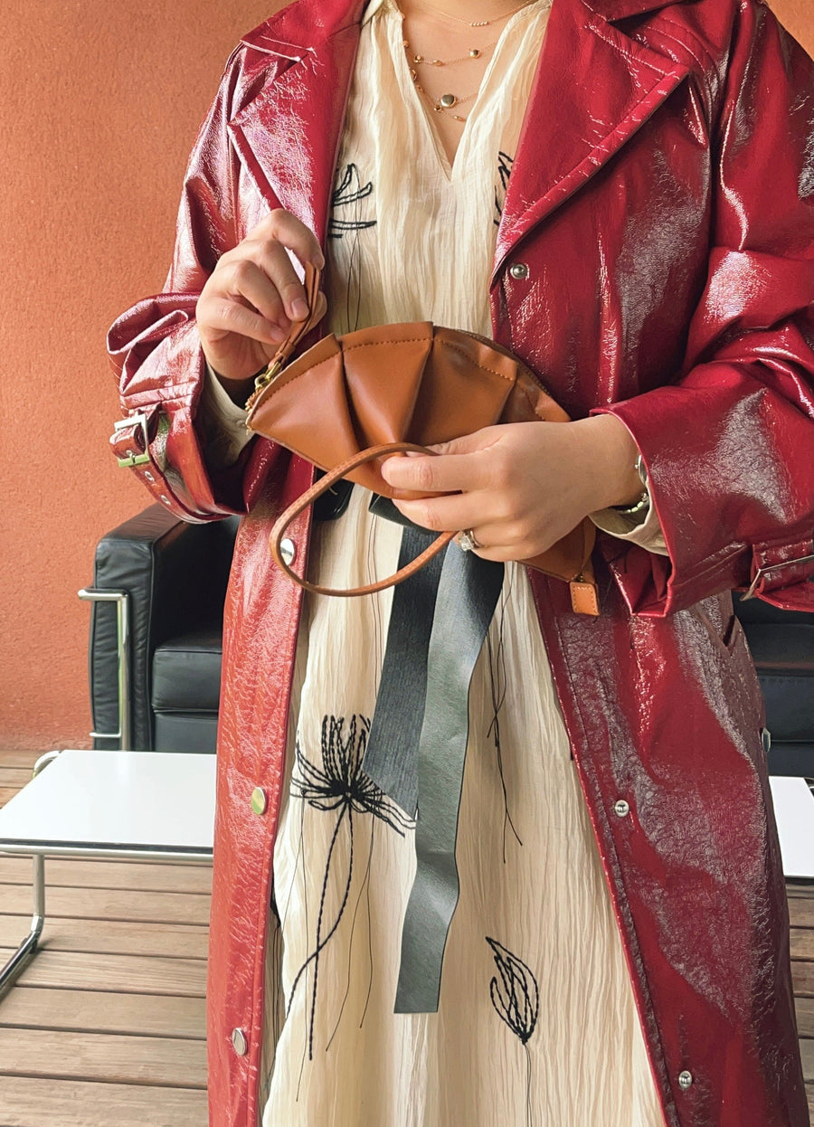 mini gyoza bag brown caramel purse handbag crossbody shoulder tan gold hardware wrist strap adjustable long strap leather zipper madrid spain international fashion imported independent designer slow fashion brand