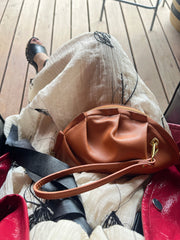 mini gyoza bag brown caramel purse handbag crossbody shoulder tan gold hardware wrist strap adjustable long strap leather zipper madrid spain international fashion imported independent designer slow fashion brand