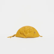 mini gyoza bag mustard yellow purse handbag crossbody shoulder convertible gold hardware short strap adjustable long strap leather zipper madrid spain international fashion imported independent designer slow fashion brand