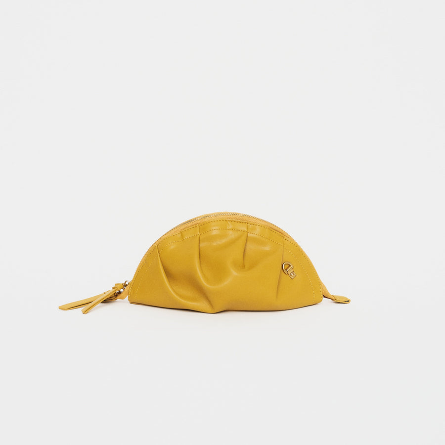 mini gyoza bag mustard yellow purse handbag crossbody shoulder convertible gold hardware short strap adjustable long strap leather zipper madrid spain international fashion imported independent designer slow fashion brand