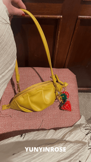 mini gyoza bag mustard yellow purse handbag crossbody shoulder convertible gold hardware short strap adjustable long strap leather zipper madrid spain international fashion imported independent designer slow fashion brand