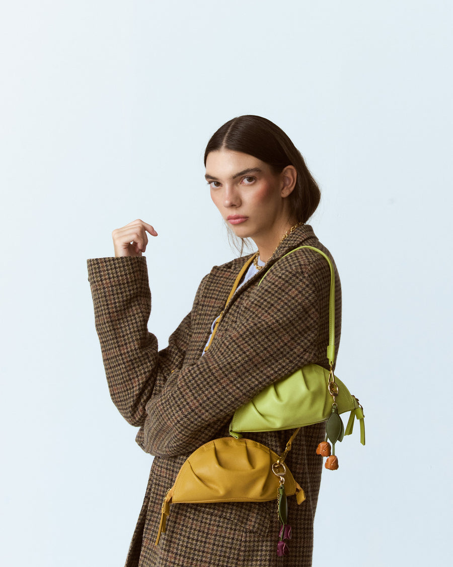 mini gyoza bag mustard yellow purse handbag crossbody shoulder convertible gold hardware short strap adjustable long strap leather zipper madrid spain international fashion imported independent designer slow fashion brand