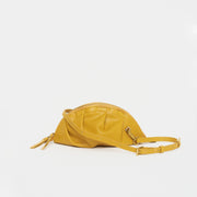 mini gyoza bag mustard yellow purse handbag crossbody shoulder convertible gold hardware short strap adjustable long strap leather zipper madrid spain international fashion imported independent designer slow fashion brand