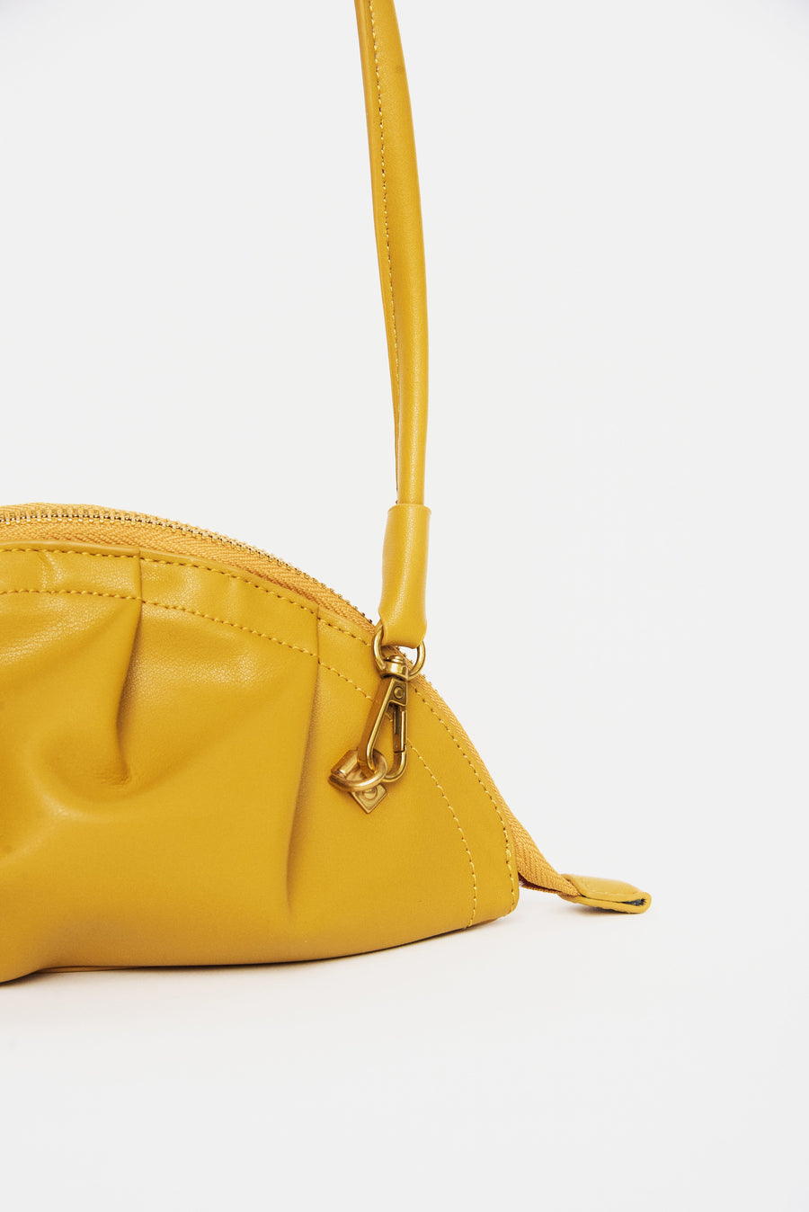 mini gyoza bag mustard yellow purse handbag crossbody shoulder convertible gold hardware short strap adjustable long strap leather zipper madrid spain international fashion imported independent designer slow fashion brand