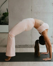 light pale baby pink white activewear matching set crop top spaghetti strap sleeveless contrast trim round neck high waisted flare leggings stretchy pilates yoga tennis golf strength training everyday soft freedom light support gym clothes athleisure workout inala quito ecuador slow fashion international global handmade sustainable